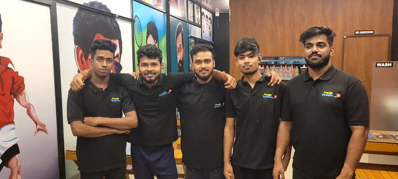 Team in custom black polo uniforms